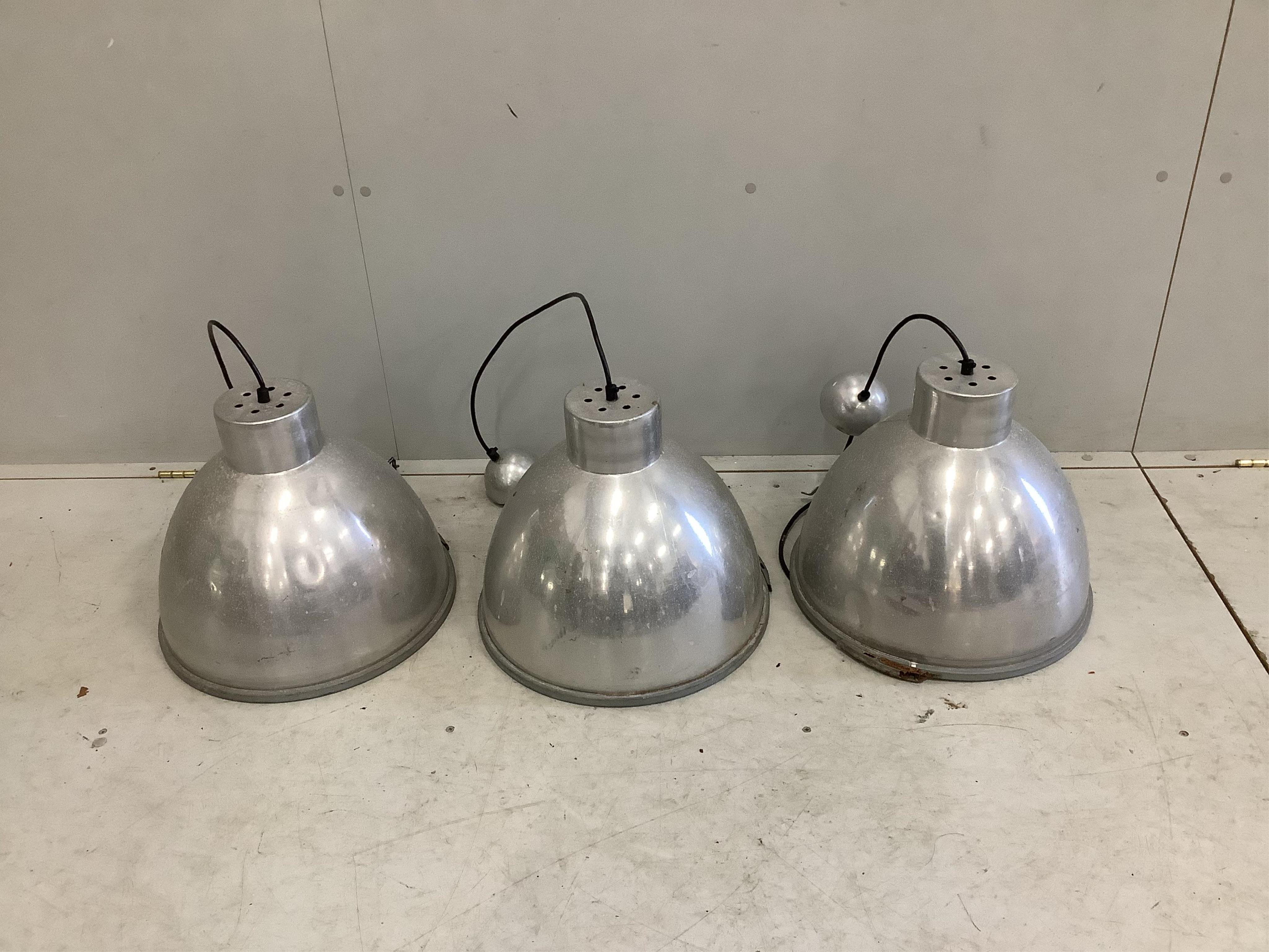 A set of three industrial style circular aluminium ceiling lights, diameter 40cm, height 33cm. Condition - poor to fair